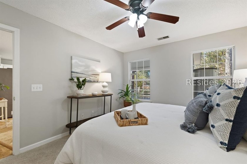 Freshly updated, this 4BR/2BA home located in The Farm offers a - photo 18