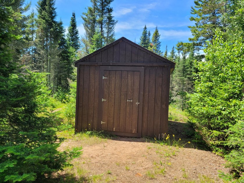 Pinestone Crossing sits on 26 shared wooded acres with over 700' - photo 21