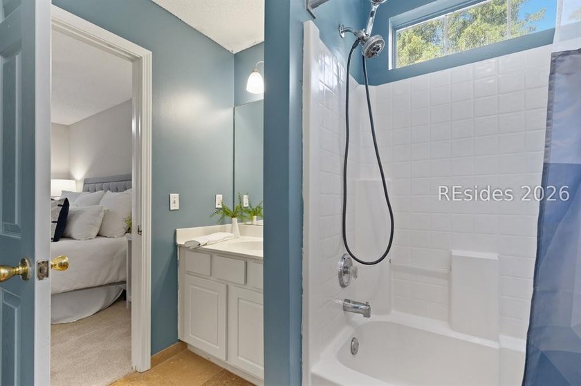 Freshly updated, this 4BR/2BA home located in The Farm offers a - photo 23