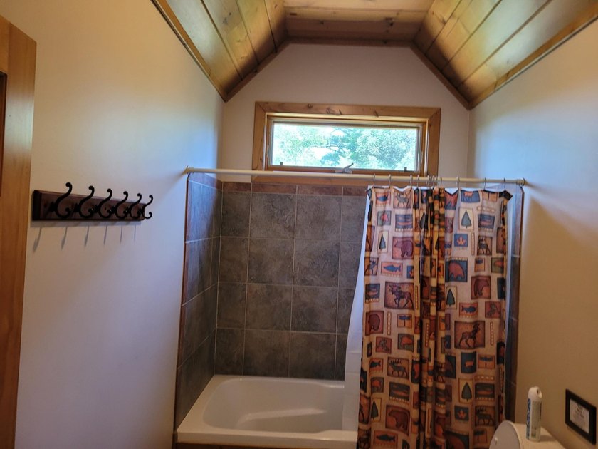Pinestone Crossing sits on 26 shared wooded acres with over 700' - photo 26