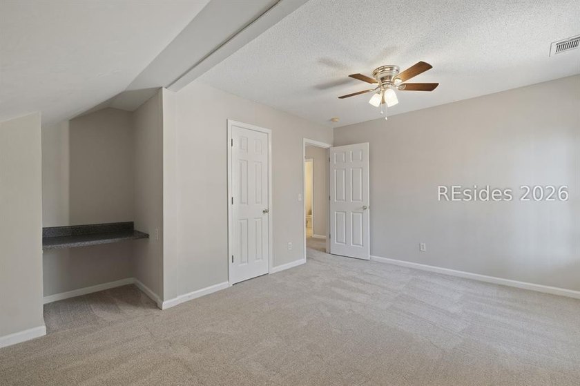 Freshly updated, this 4BR/2BA home located in The Farm offers a - photo 28