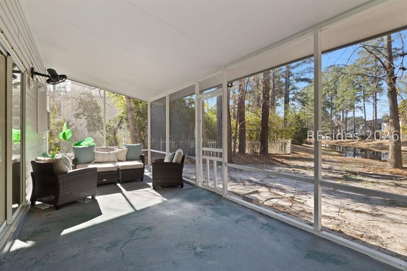 Freshly updated, this 4BR/2BA home located in The Farm offers a - photo 33