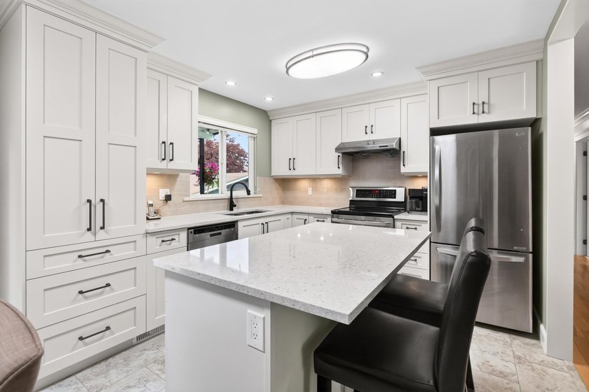 Welcome to this beautifully renovated 4-bedroom home, perfectly - photo 9