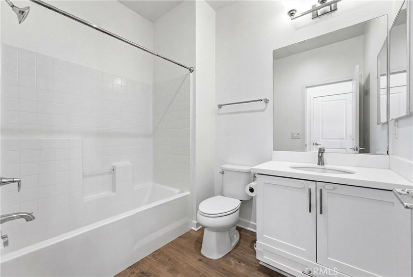 Welcome to this beautifully upgraded end unit townhome located - photo 18