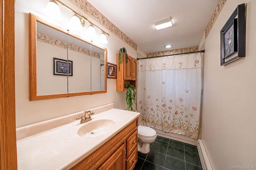 Welcome to this spacious 4-bedroom, 2-bath home in the heart of - photo 22