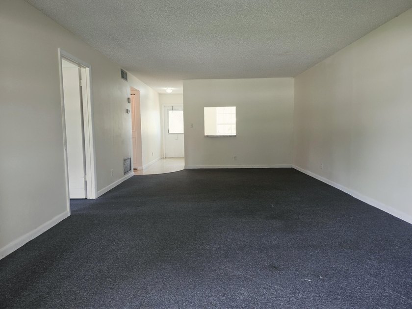 Located in the vibrant and social 55+ community of Covered - photo 5