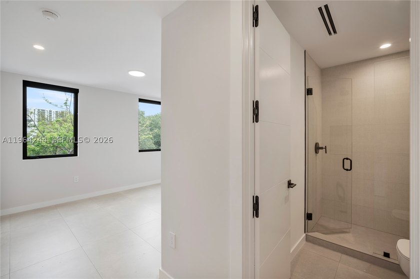 Discover this one-of-a-kind 5-bedroom, 5.5-bath modern townhome - photo 32