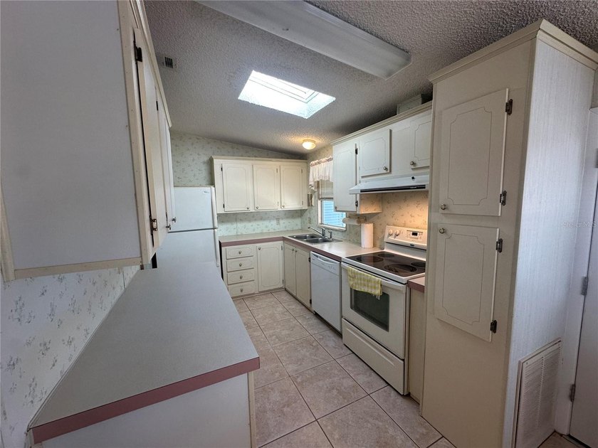Located in the award-winning 55+ community of Harbor Isles in - photo 3