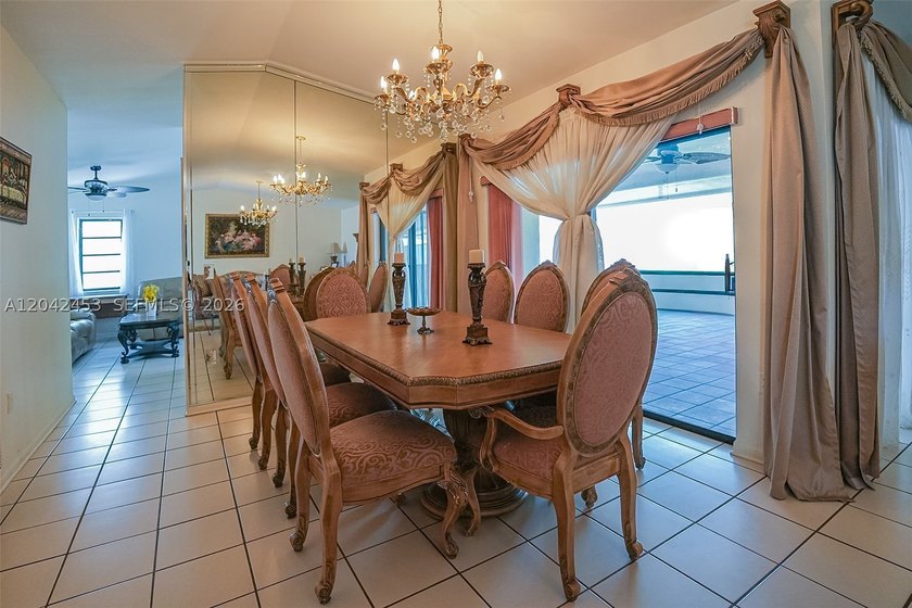 This charming 1988-built residence offers three bedrooms and two - photo 4