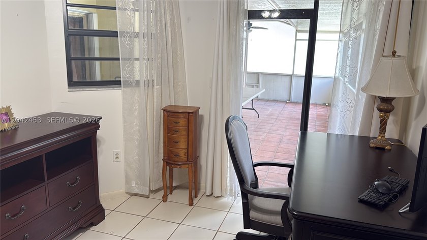 This charming 1988-built residence offers three bedrooms and two - photo 8