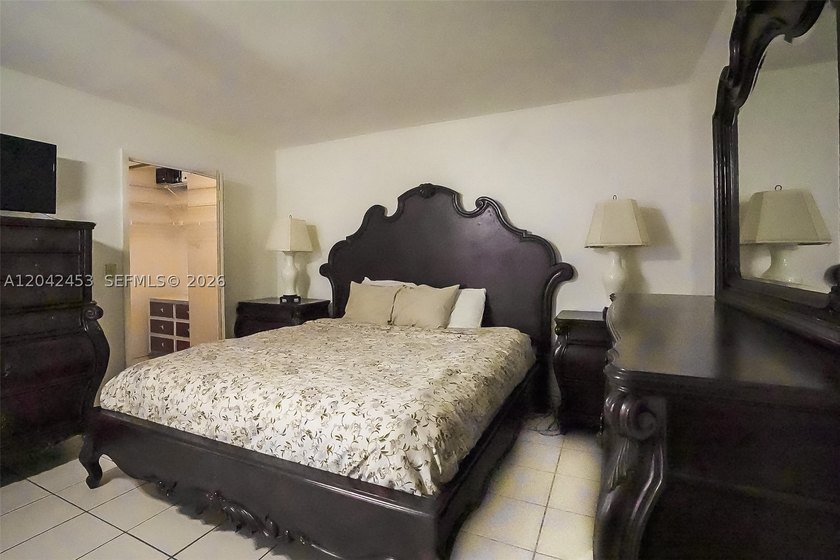 This charming 1988-built residence offers three bedrooms and two - photo 9