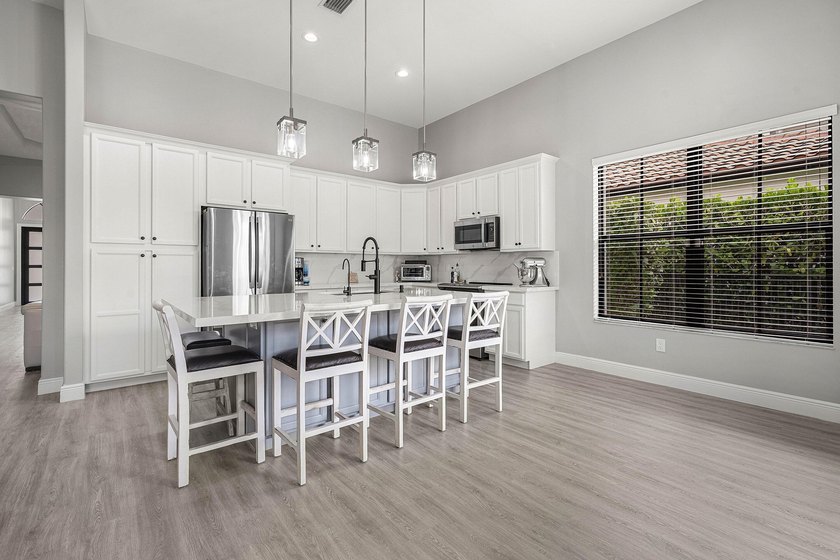 Welcome to this beautifully updated 4-bedroom, 3-bathroom home - photo 8