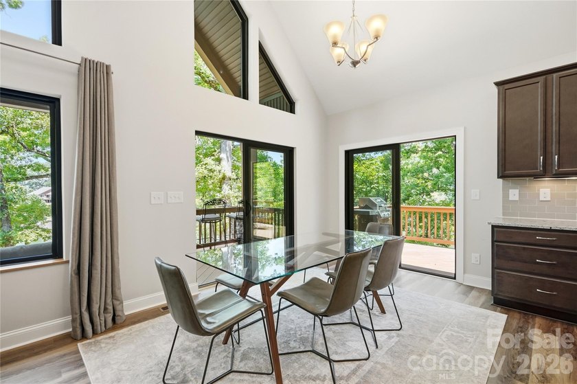 Peaceful waterfront retreat nestled on a beautifully wooded lot - photo 13