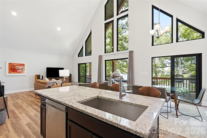 Peaceful waterfront retreat nestled on a beautifully wooded lot - photo 18