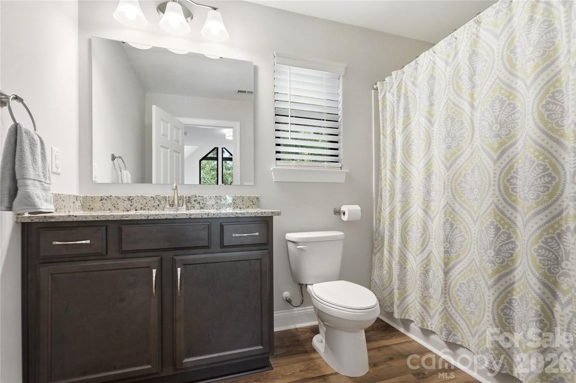 Peaceful waterfront retreat nestled on a beautifully wooded lot - photo 26