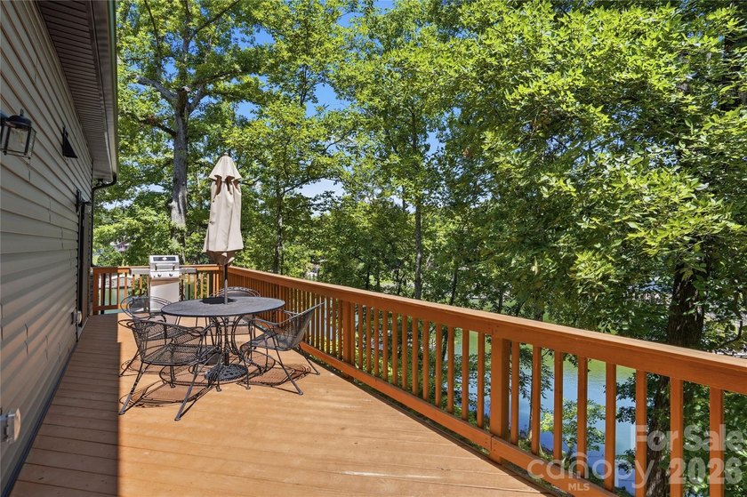 Peaceful waterfront retreat nestled on a beautifully wooded lot - photo 31