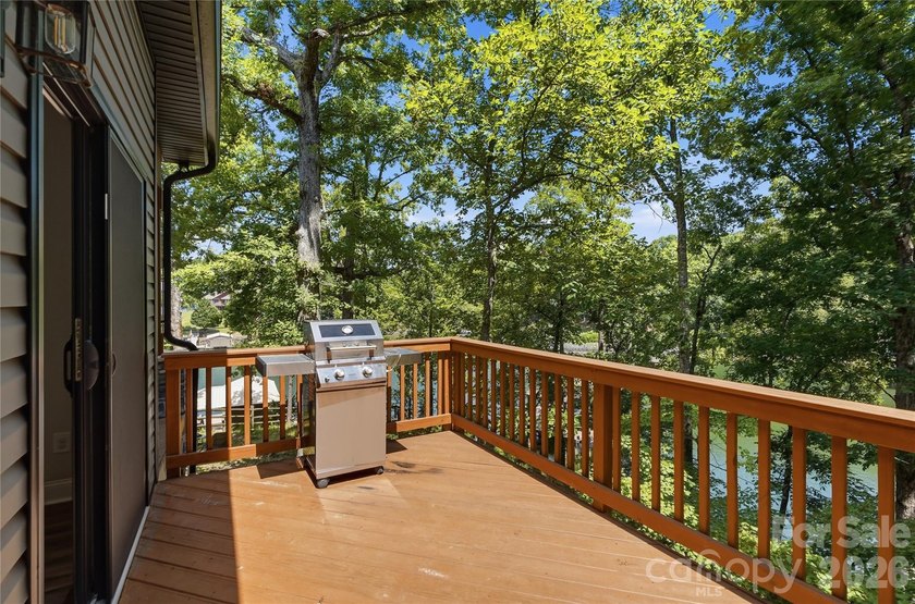 Peaceful waterfront retreat nestled on a beautifully wooded lot - photo 32