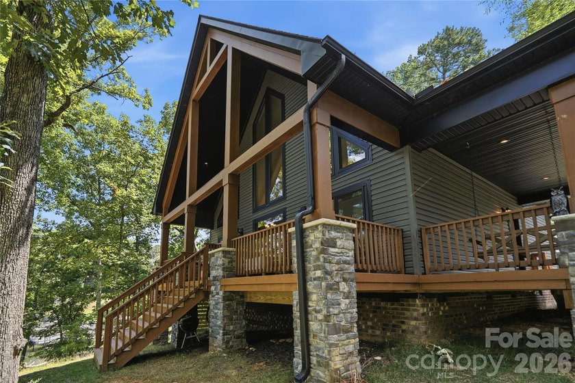 Peaceful waterfront retreat nestled on a beautifully wooded lot - photo 34