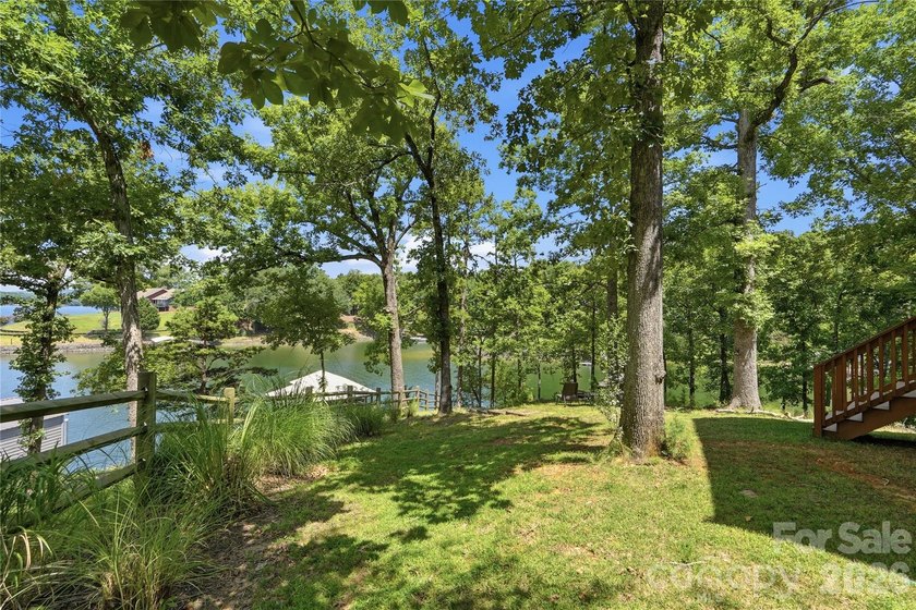 Peaceful waterfront retreat nestled on a beautifully wooded lot - photo 35