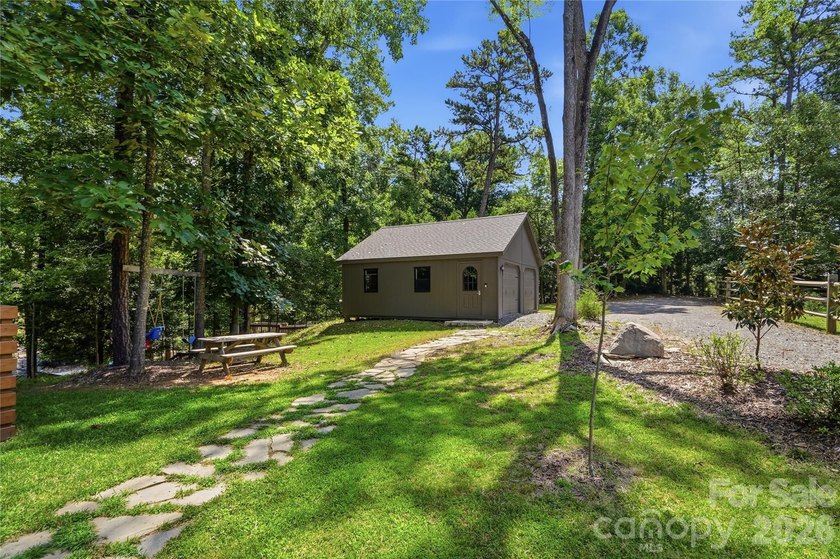 Peaceful waterfront retreat nestled on a beautifully wooded lot - photo 36
