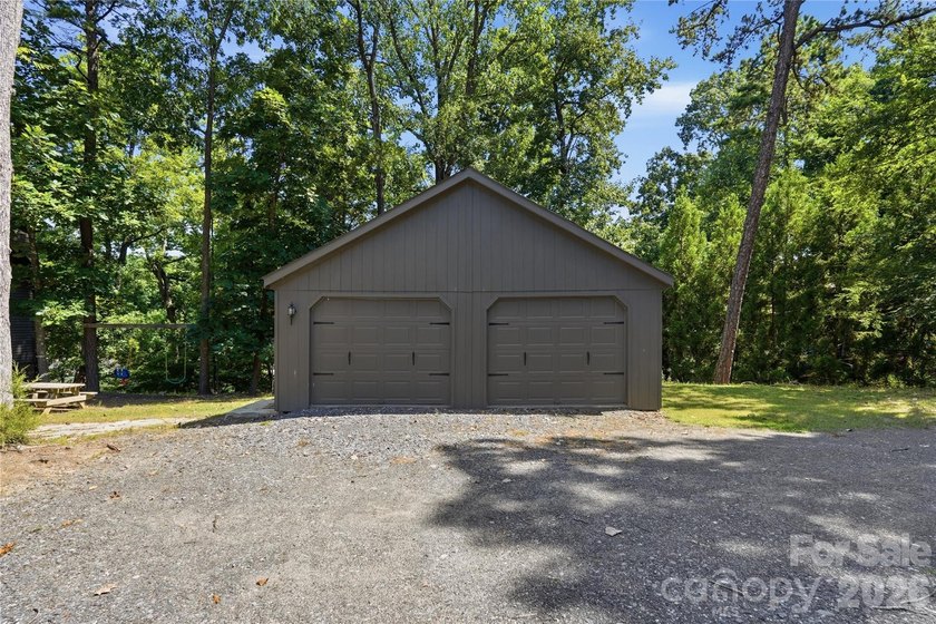 Peaceful waterfront retreat nestled on a beautifully wooded lot - photo 37