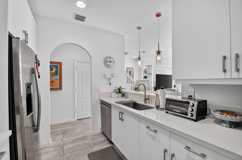 Newer construction, builder-upgraded townhome maintained in - photo 6