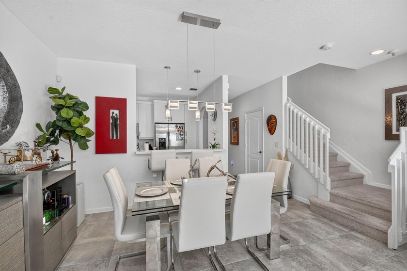 Newer construction, builder-upgraded townhome maintained in - photo 7