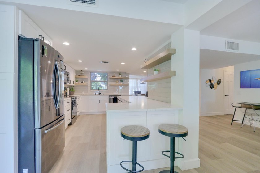 Experience the perfect blend of luxury and lifestyle in this - photo 25