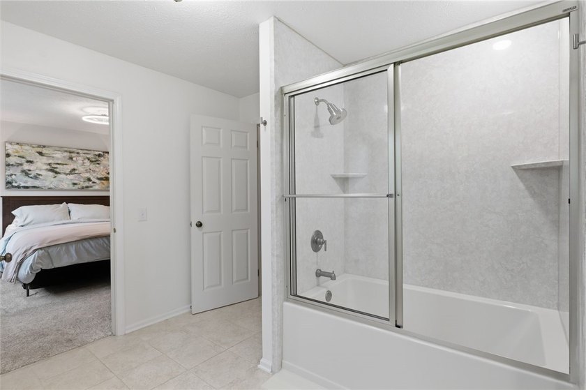 Welcome to this sparkling, move-in ready end-unit townhome in - photo 16