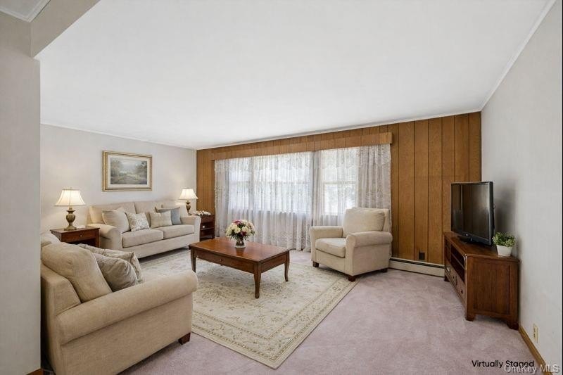 Welcome to 265 Hummel Ave in Southold, a charming two-bedroom - photo 3