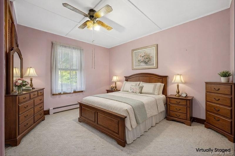 Welcome to 265 Hummel Ave in Southold, a charming two-bedroom - photo 6