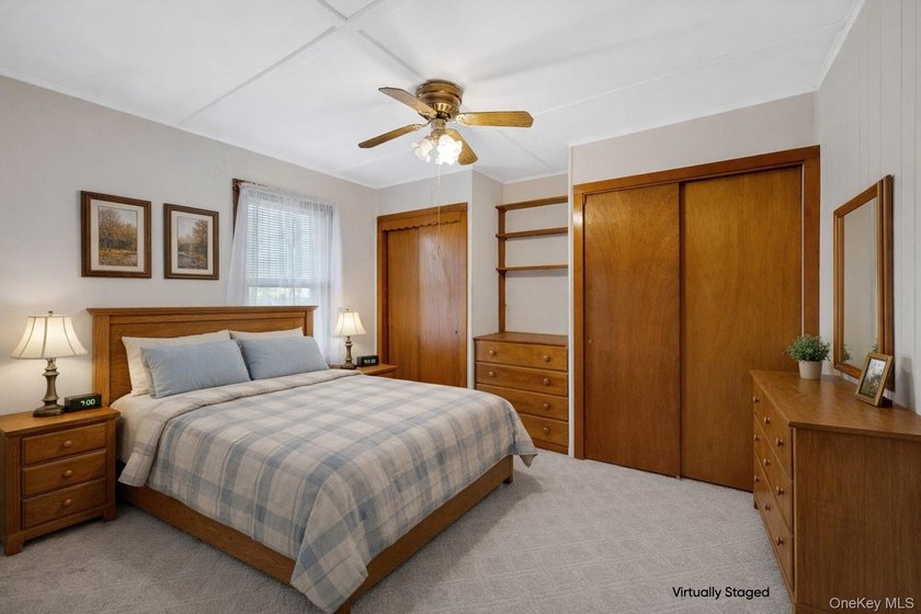 Welcome to 265 Hummel Ave in Southold, a charming two-bedroom - photo 8