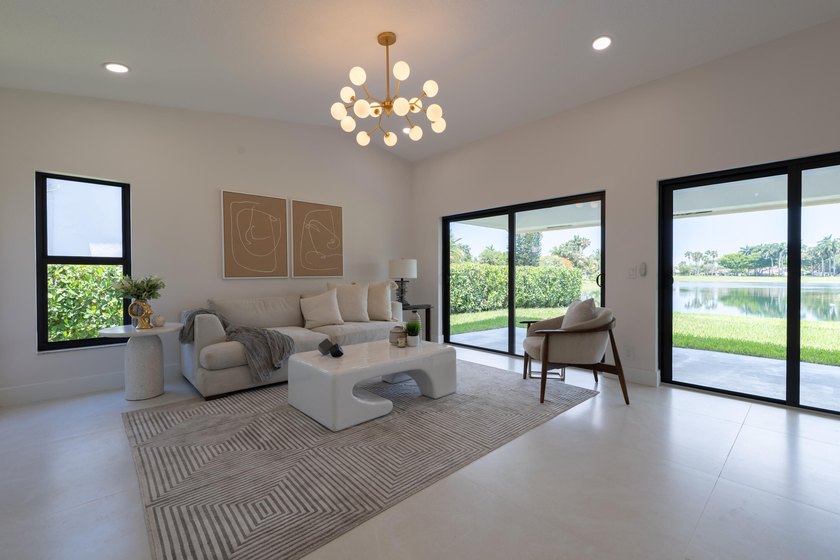 Welcome home to this extensively renovated lakefront home in the - photo 3