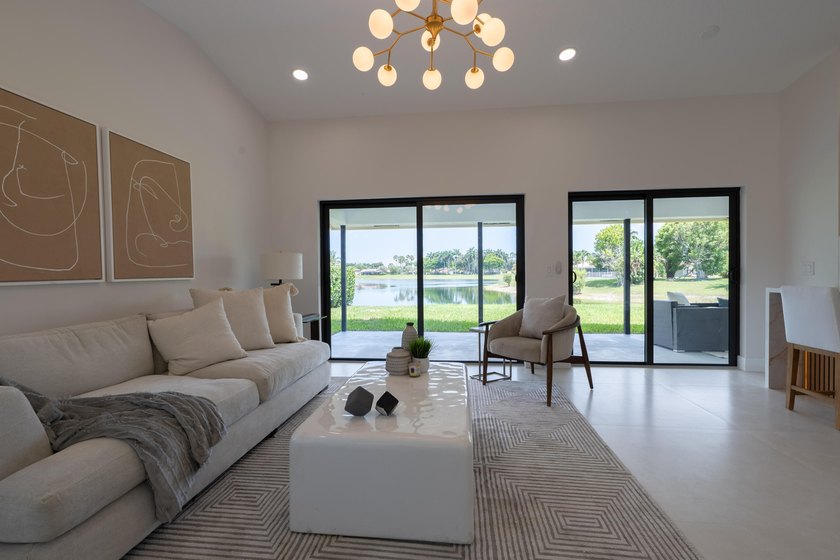 Welcome home to this extensively renovated lakefront home in the - photo 4