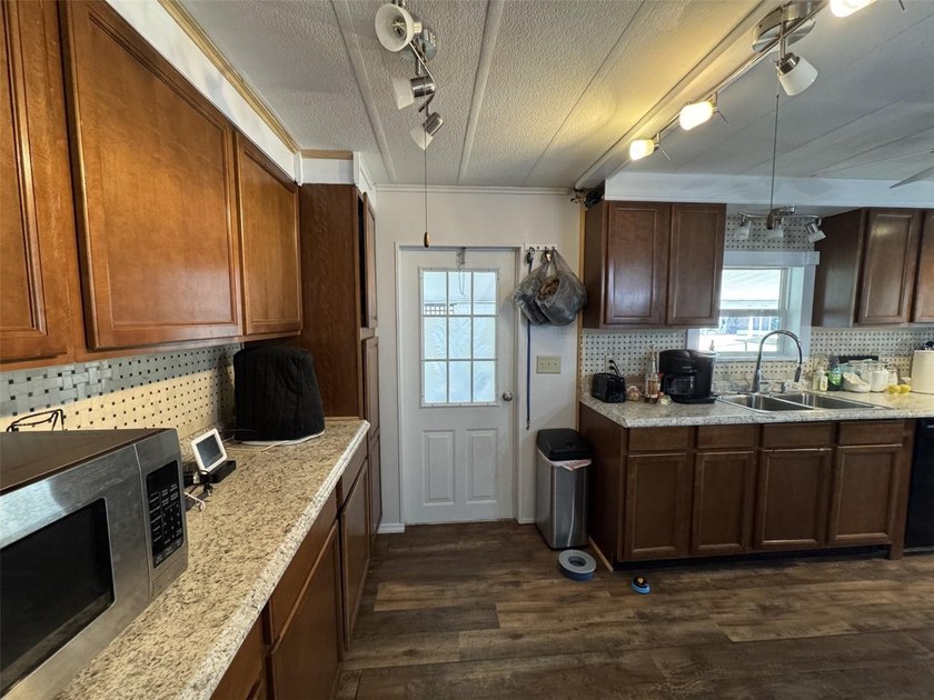 BACK ON THE MARKET!! YOU OWN THE LAND!! WELCOME HOME TO THIS - photo 17