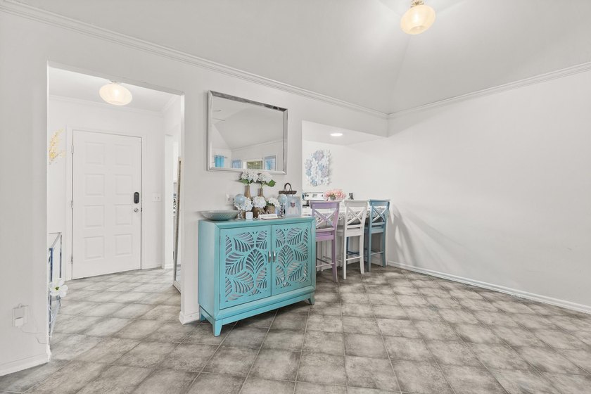 This renovated 2-bedroom, 2-bath condo has a newer roof (2022) - photo 3