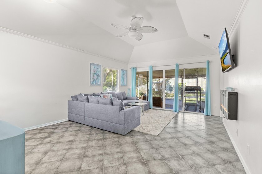 This renovated 2-bedroom, 2-bath condo has a newer roof (2022) - photo 4