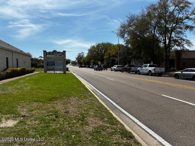 Prime commercial parcel available! This vacant lot offers a - photo 2