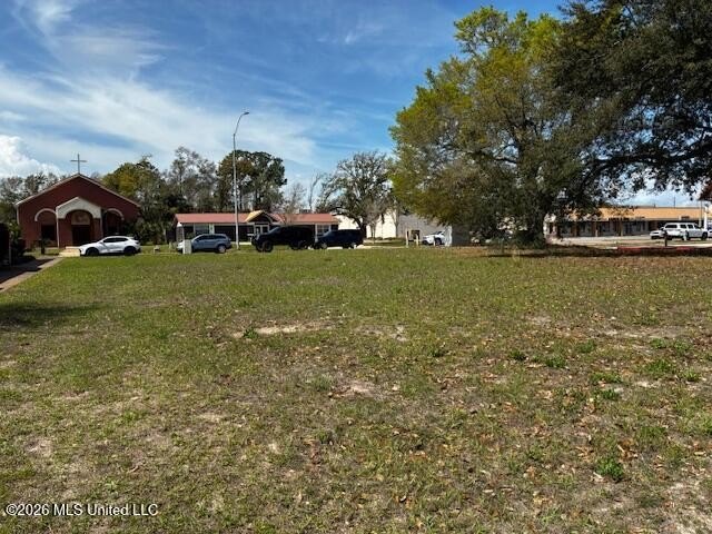 Prime commercial parcel available! This vacant lot offers a - photo 4