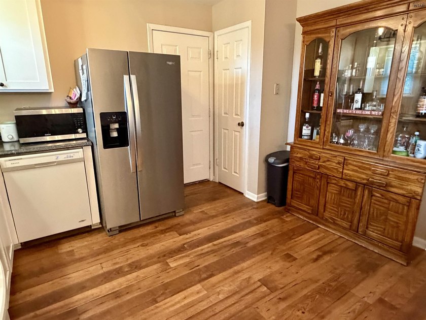 Step inside this 3-bedroom, 1.5-bath home offering comfortable - photo 11