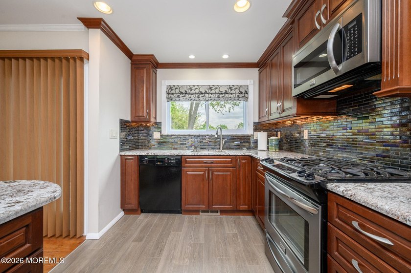 Home Sweet Home! Beautiful 3 Bed 2.5 Bath Expanded Bi-Level with - photo 12