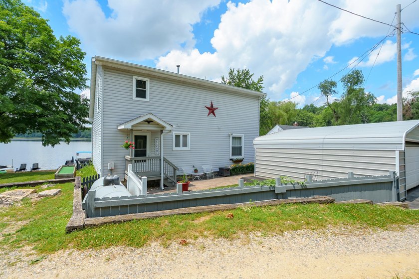 Lake life starts here. This beautifully maintained waterfront - photo 31