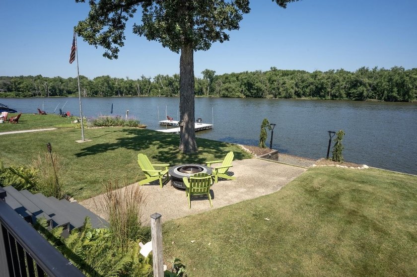Experience waterfront living at its finest in this beautifully - photo 32