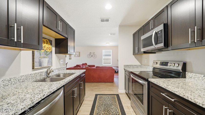 **Seller offering up to $10k towards closing costs!!** Tucked - photo 8