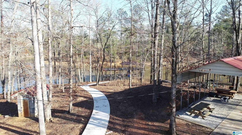 Exceptional point waterfront lot offering year-round water and a - photo 3