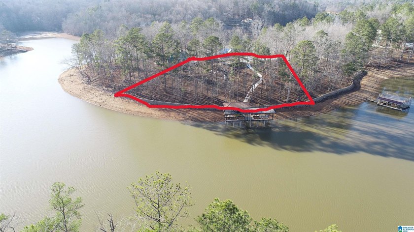 Exceptional point waterfront lot offering year-round water and a - photo 6