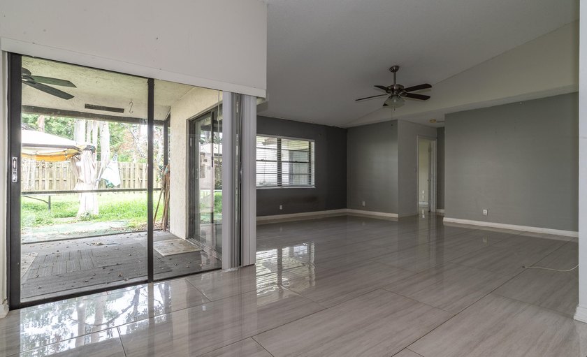 This 3-bedroom, 2-bathroom single-story home offers 1,672 square - photo 6