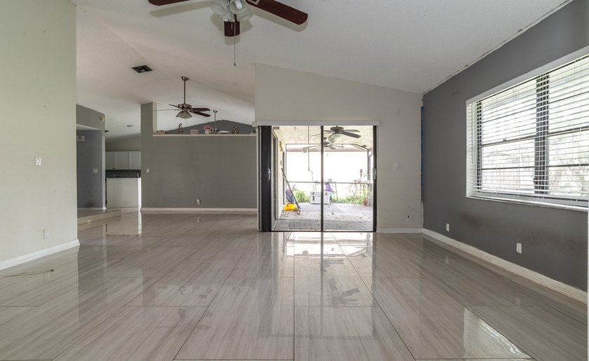 This 3-bedroom, 2-bathroom single-story home offers 1,672 square - photo 10
