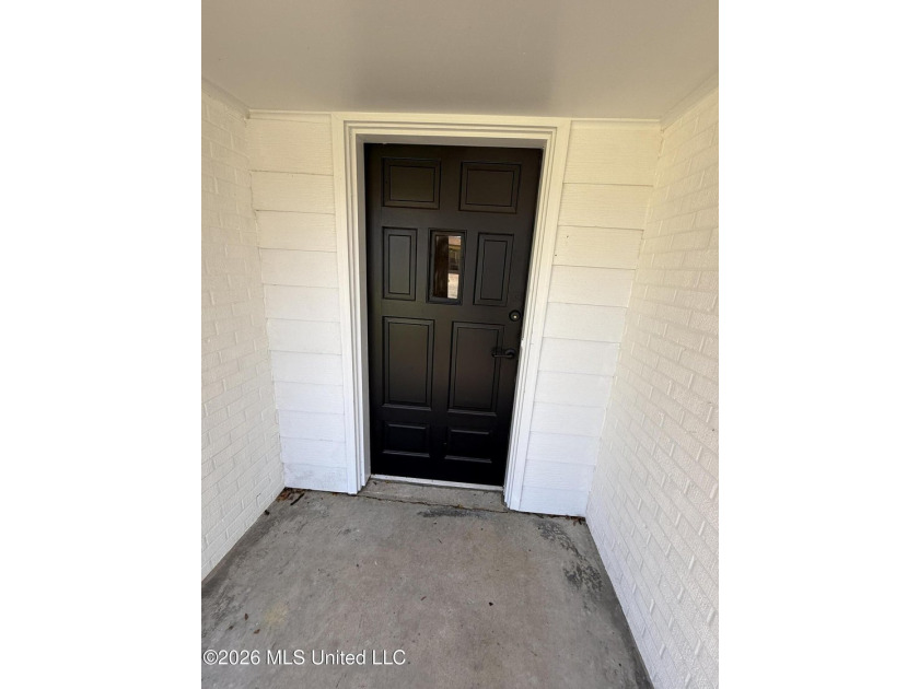 Beautifully remodeled brick ranch just a short walk to the beach - photo 3