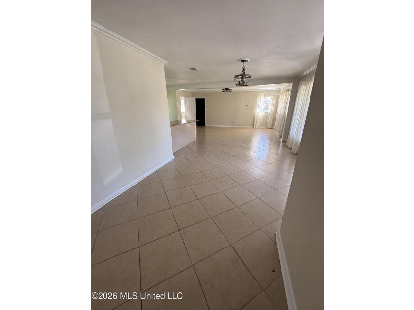 Beautifully remodeled brick ranch just a short walk to the beach - photo 4